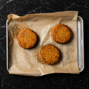 Firm lentil burgers with a lightly spiced flavour and a crisp exterior when cooked.