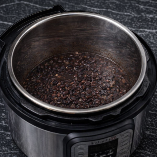 Soft, lightly spiced black beans with enough liquid to keep them versatile for everyday use.