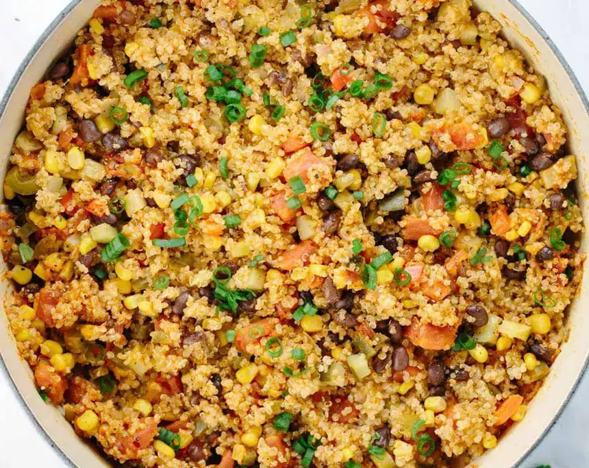 A one‑pan quinoa dish cooked with vegetables, beans, and mild spices, designed for quick weeknight meals with minimal washing up.